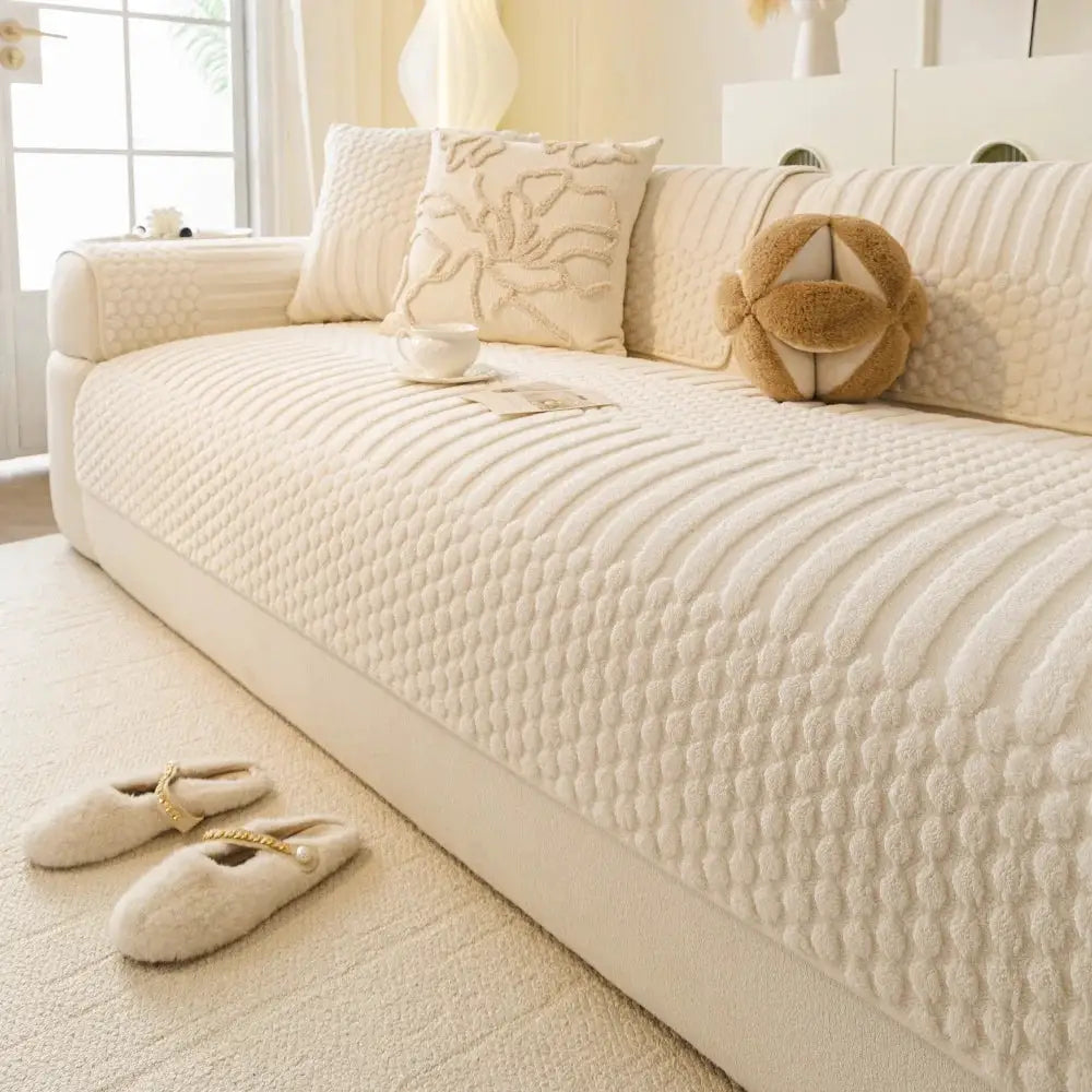 Simples Market sofa cover, thick warm geometric jacquard fleece with anti-slip backing in cream.