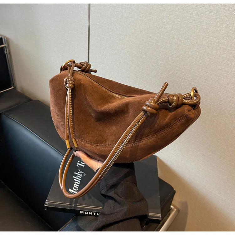 Simples Market faux suede shoulder bag in brown with knotted straps, crossbody style for women.