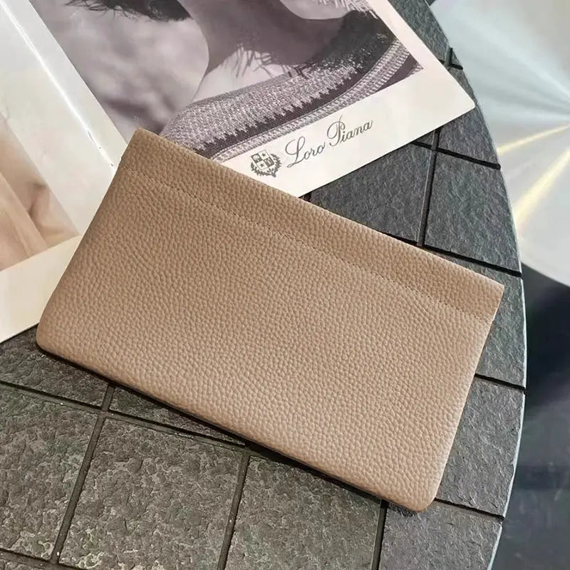 Artificial leather long wallet in tan with pebbled texture.