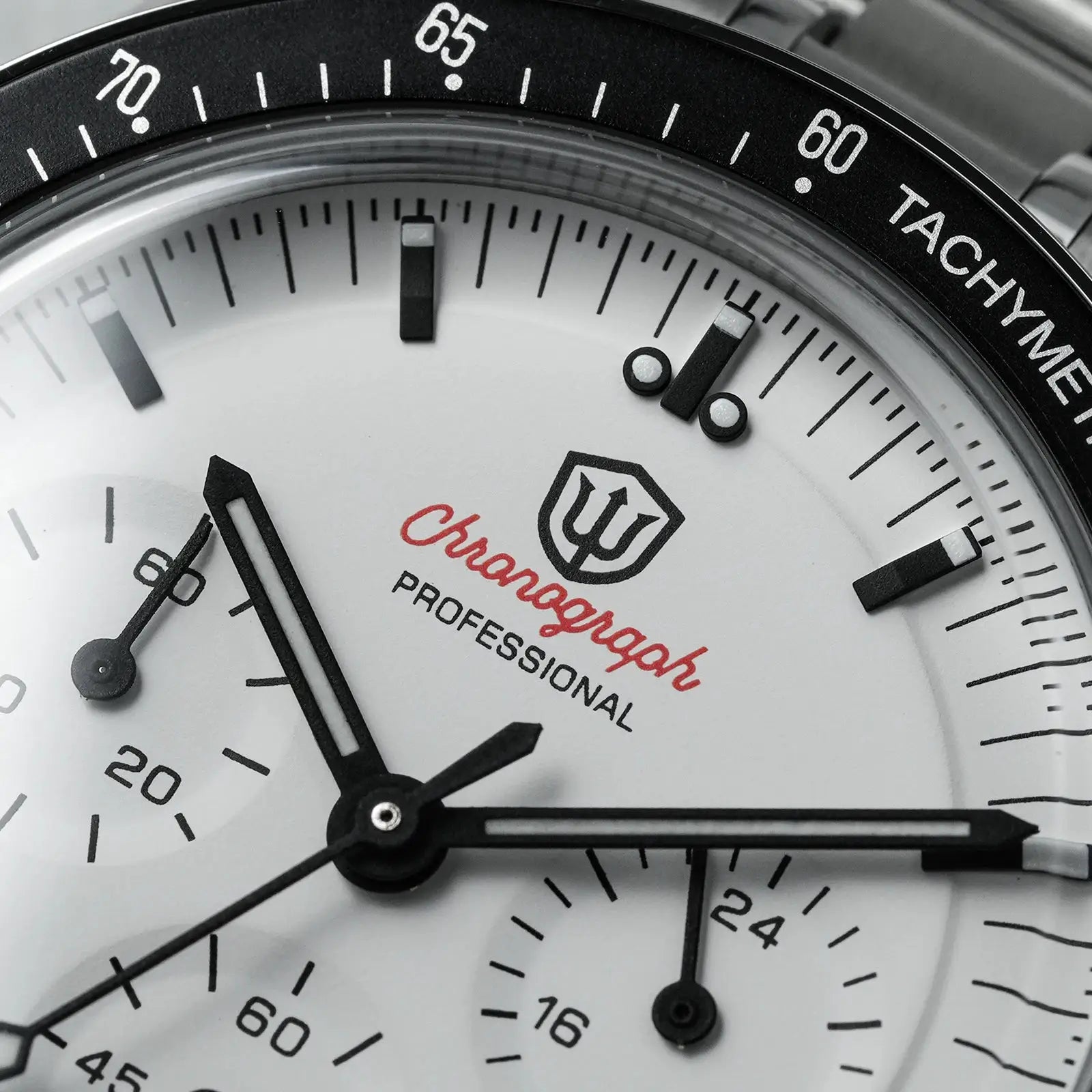 Watchdives WD1863 chronograph watch with white dial, black tachymeter bezel, shield logo, luminous hands