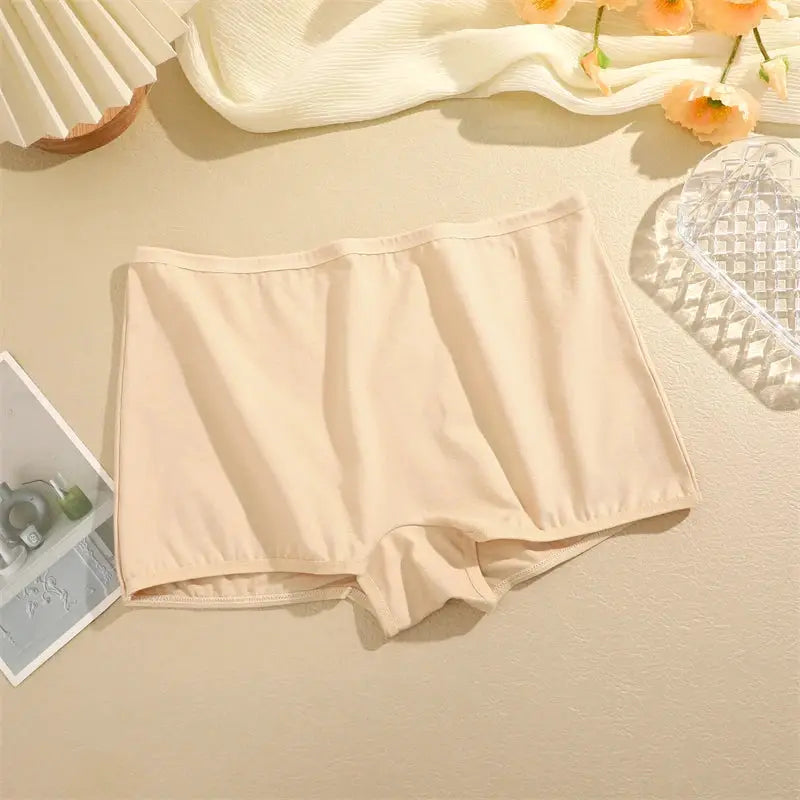 Women's cotton seamless boxer briefs in nude color; soft and comfortable underwear.