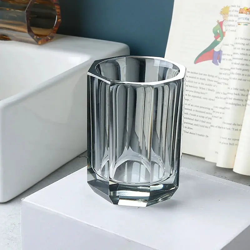 Glass bathroom cup with faceted clear crystal design