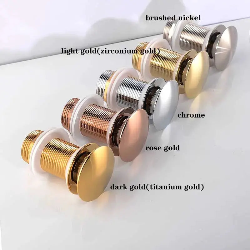 Bathroom sink push-down pop-up drain stoppers in six finishes; brushed nickel, light gold, chrome.