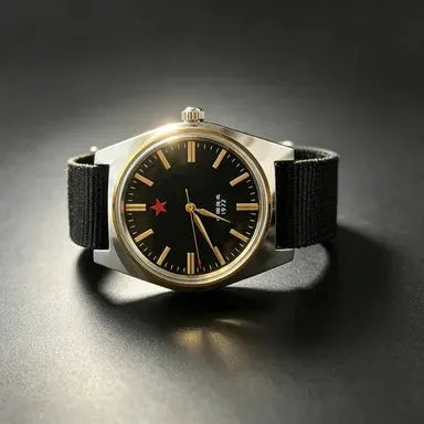 Men's mechanical watch, 36mm stainless steel case with black dial and gold-tone hands, black fabric strap, Simples Market.