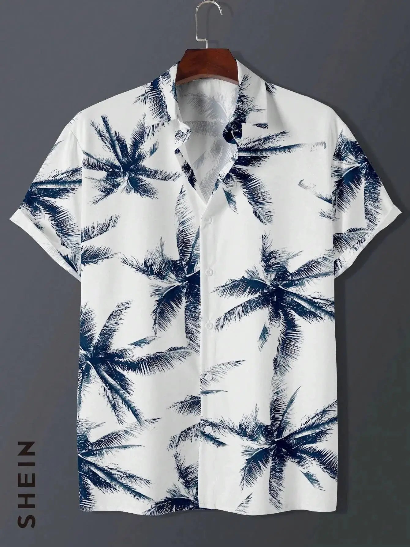 Hawaiian shirt with navy palm tree print on white, short sleeves, button-front, on hanger; brand SHEIN.