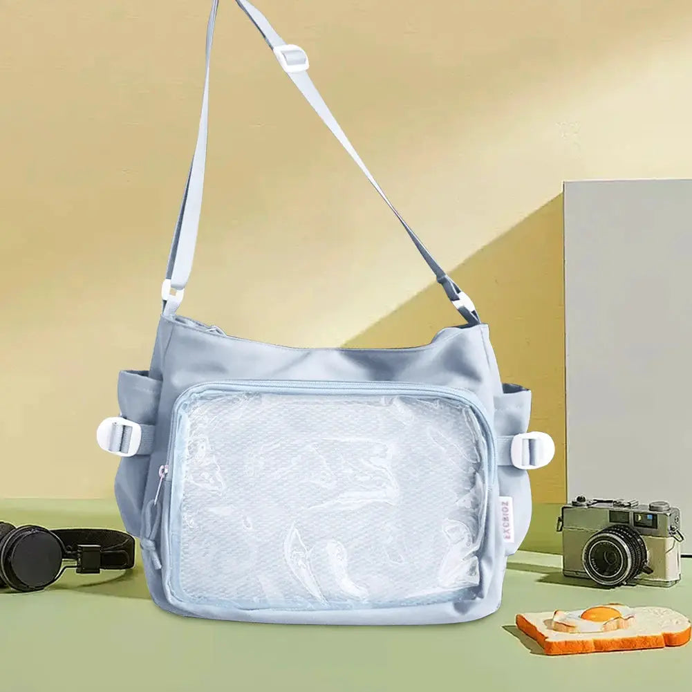 Light blue women ita bag with clear front window, multiple pockets, adjustable strap by Simples Market