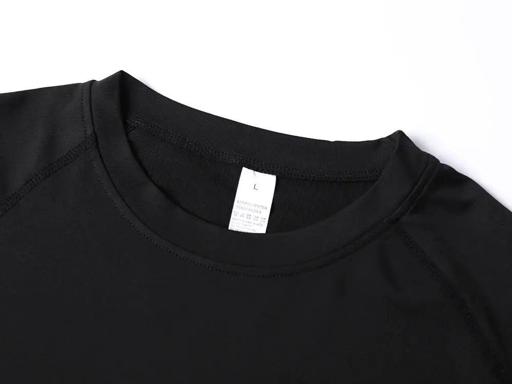 Simples Market black athletic compression T-shirt with visible size tag