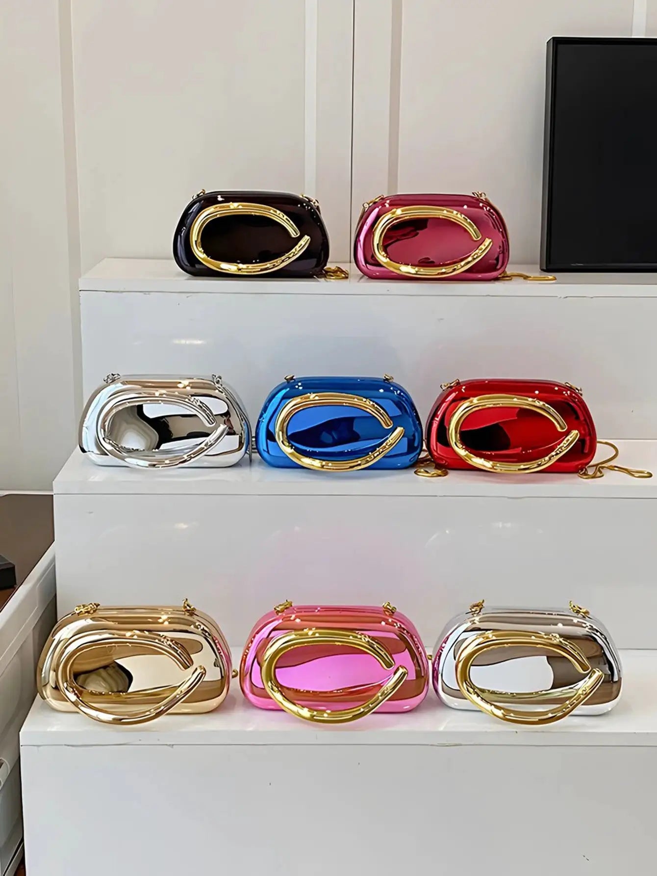 Simples Market acrylic box-shaped crossbody bags in assorted colors with gold hardware