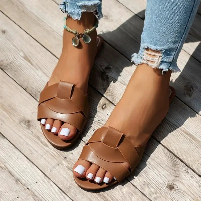 Sandals by Simples Market, brown cork suede cross-strap slides with arch support worn on feet