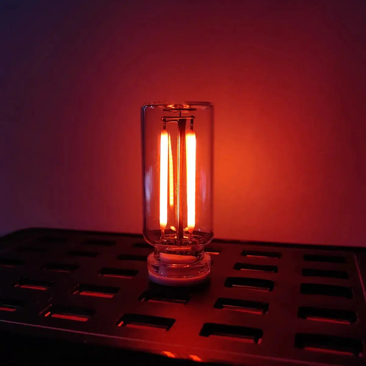 Portable USB touch night light with glass cylinder filament LED, warm amber glow
