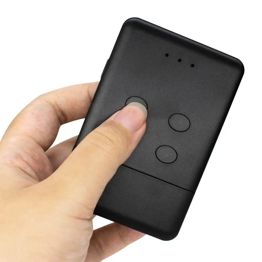 Smart garage remote in black with two round buttons