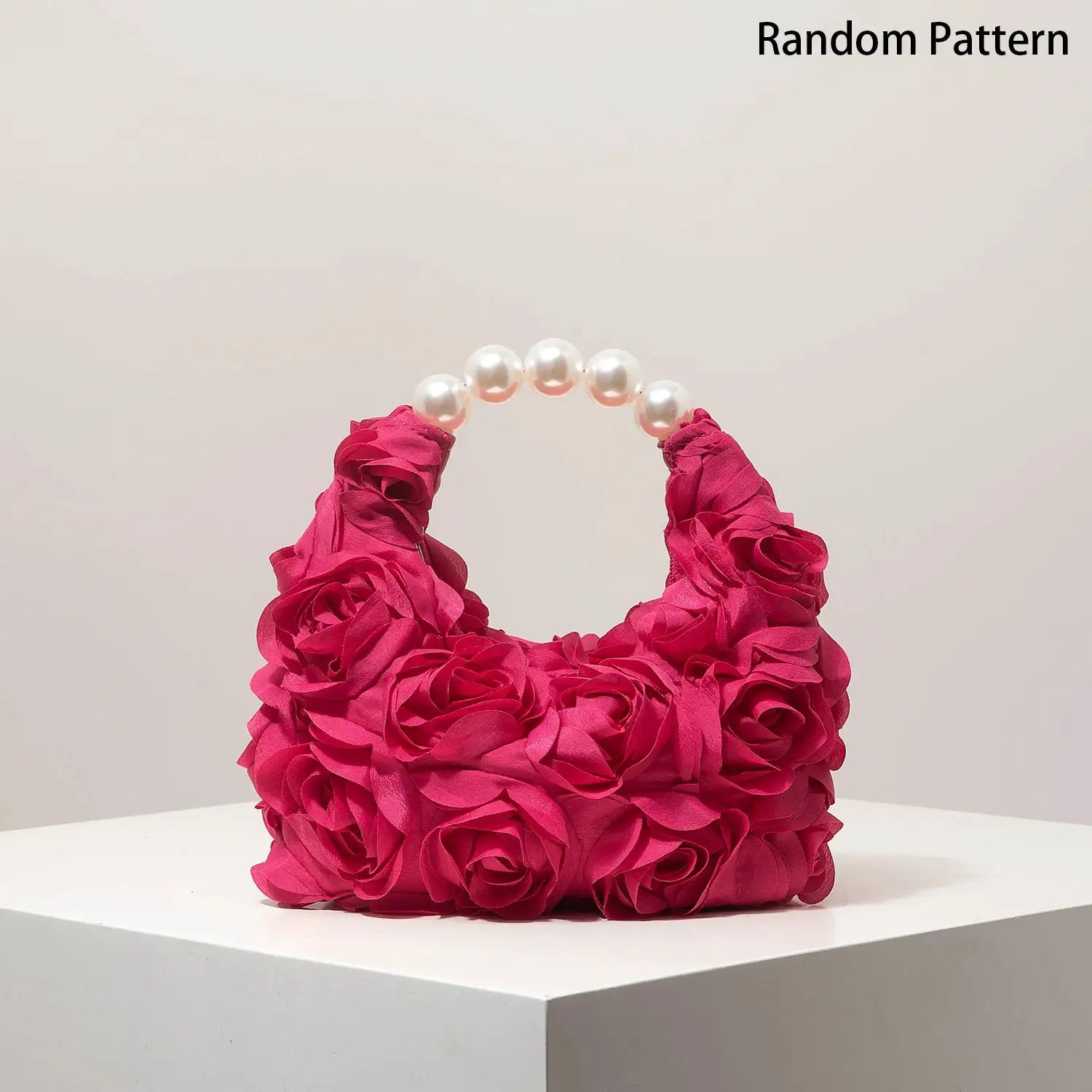 Pink rose-covered handbag with a pearl-bead handle