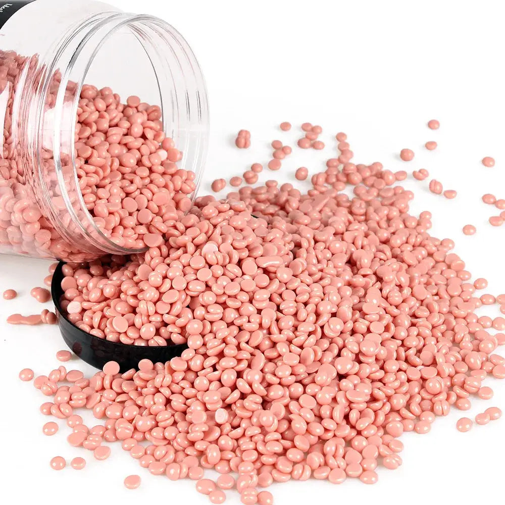Pink depilatory wax beads spilled from a jar, suitable for heating hard wax machines (200g/400g)