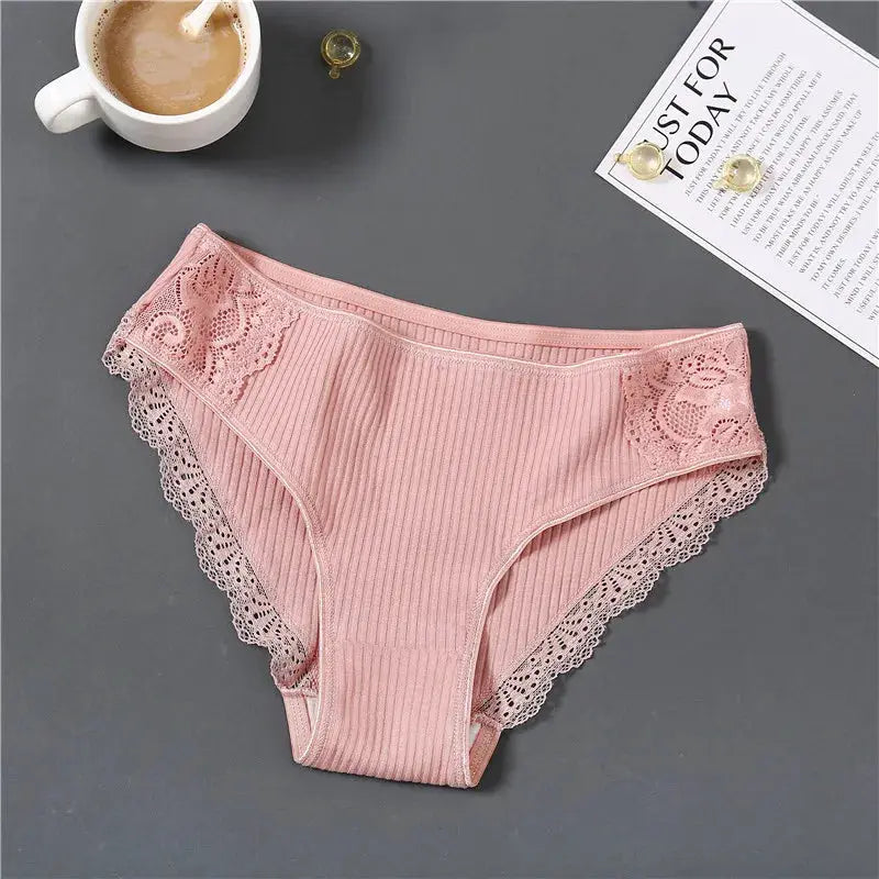 Pink cotton panties with lace trim on the sides and leg openings, low-rise briefs with ribbed fabric