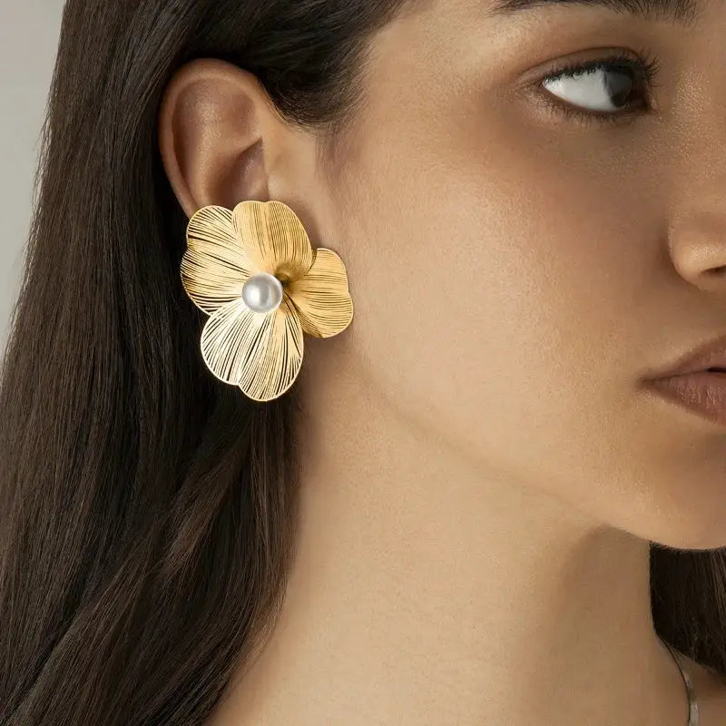Large flower pearl earrings by Simples Market; gold-tone textured petals with central pearl for women
