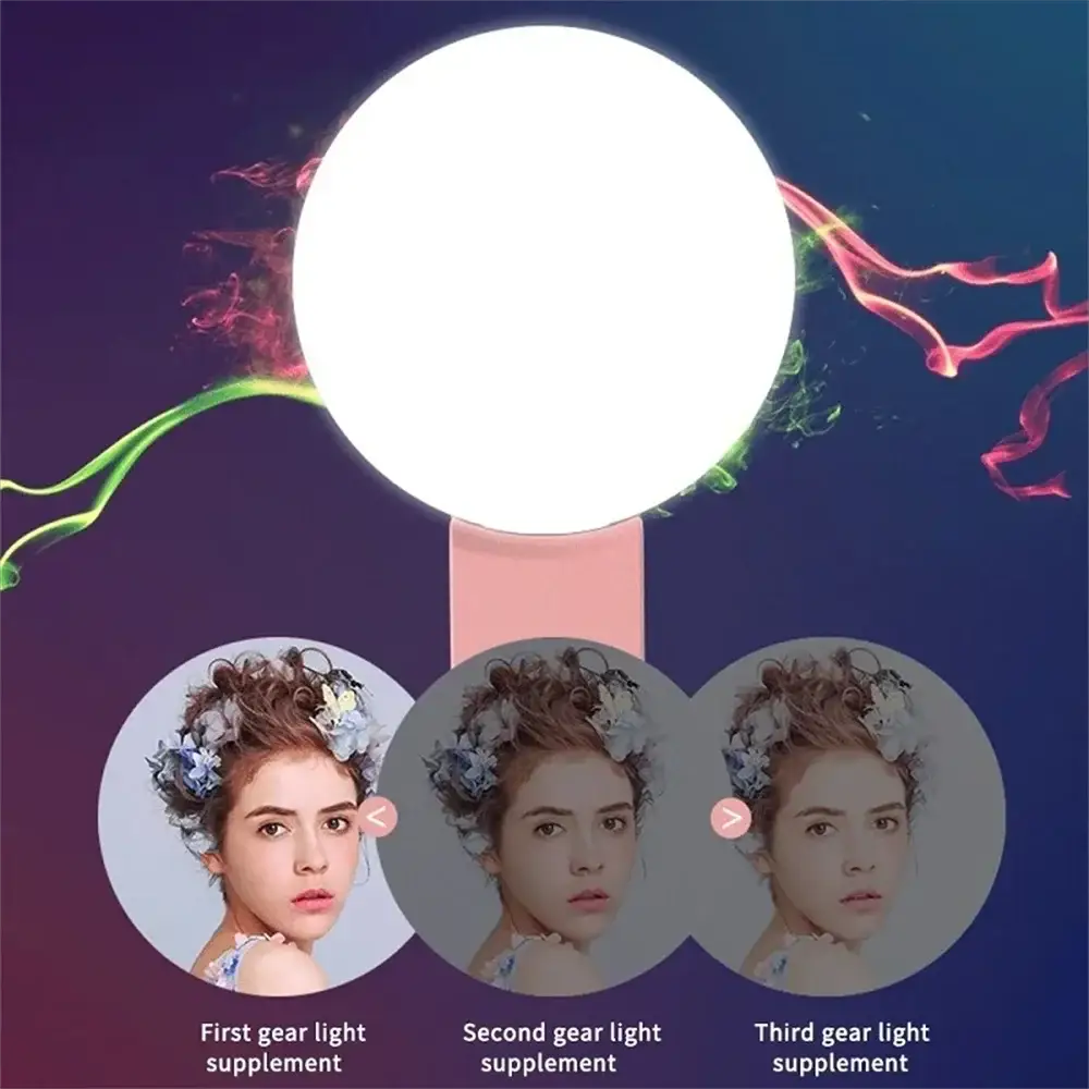Simples Market portable LED selfie light for smartphones; circular white lamp on pink base with three brightness levels