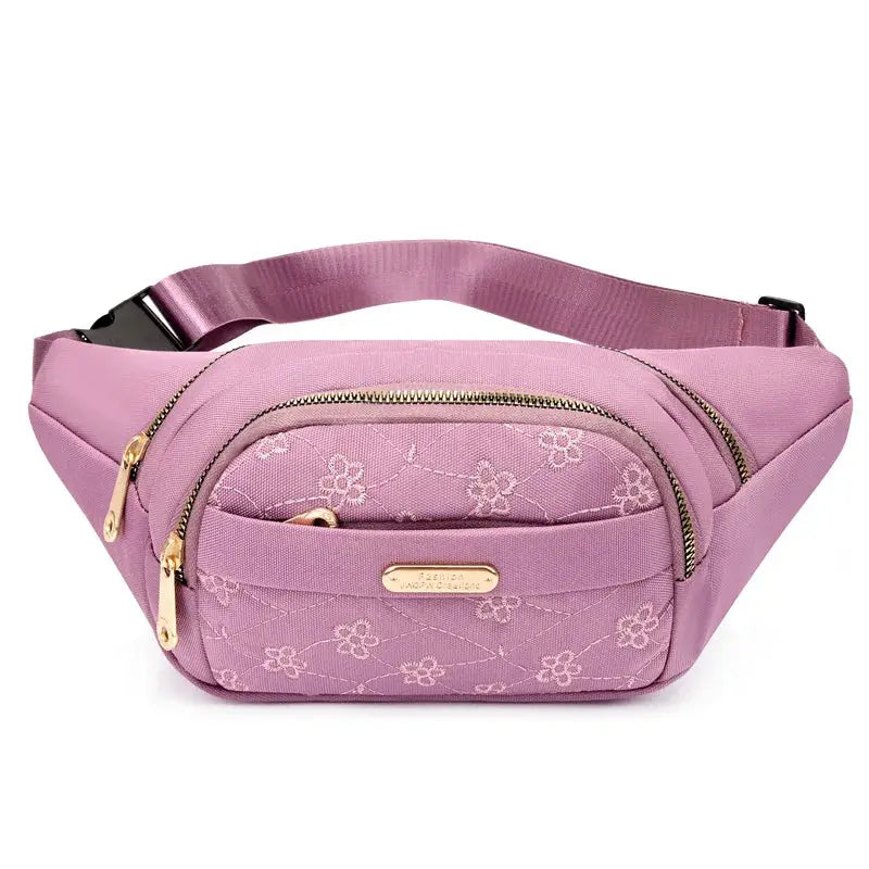 Women's pink Oxford cloth waterproof waist bag by Simples Market with floral front pocket and gold zippers