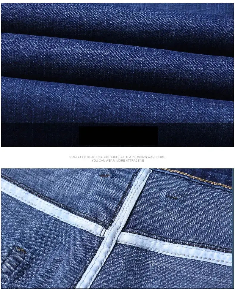 Men's straight denim jeans in blue stretch fabric with white contrast stitching.