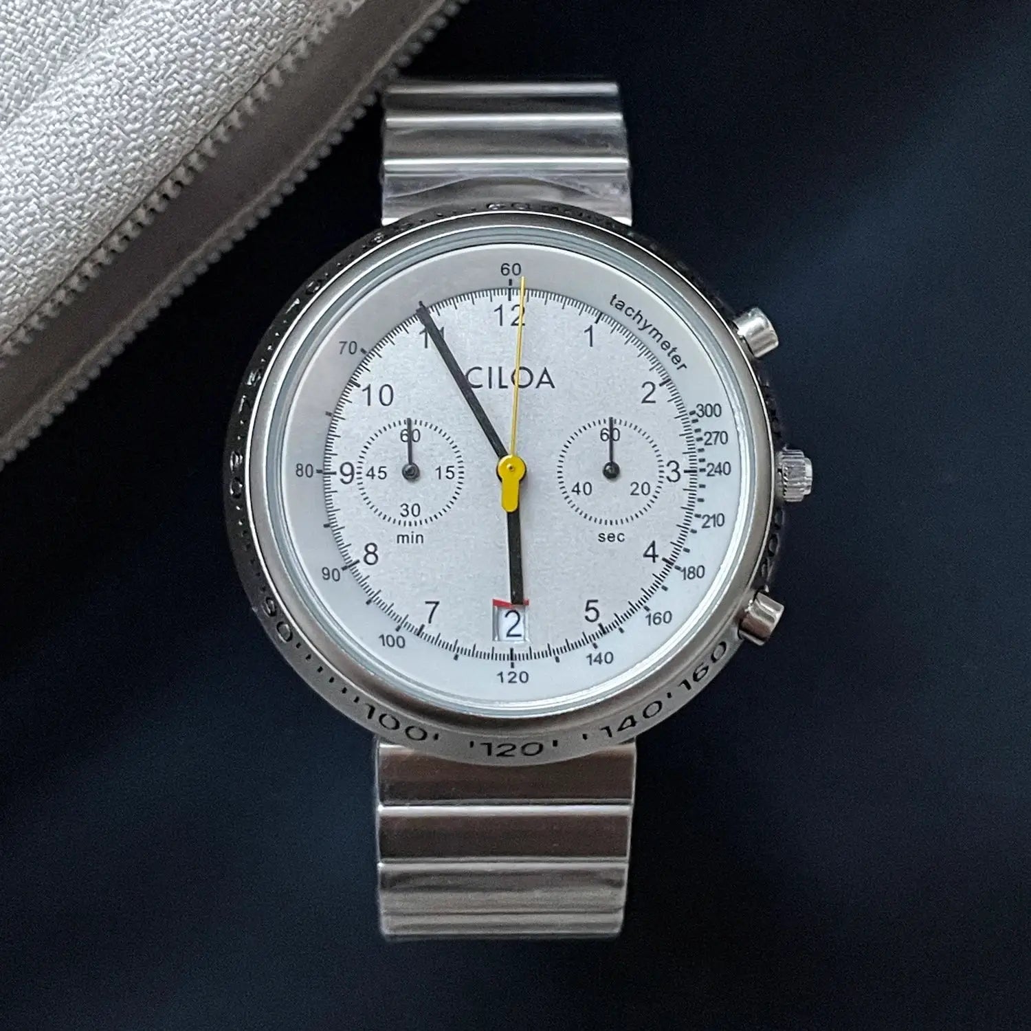 CILOA men's chronograph watch with large round silver dial, tachymeter bezel and stainless steel bracelet