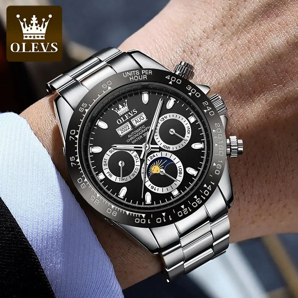 OLEVS automatic men's watch with stainless steel case and bracelet, black dial, luminous hands, date window.
