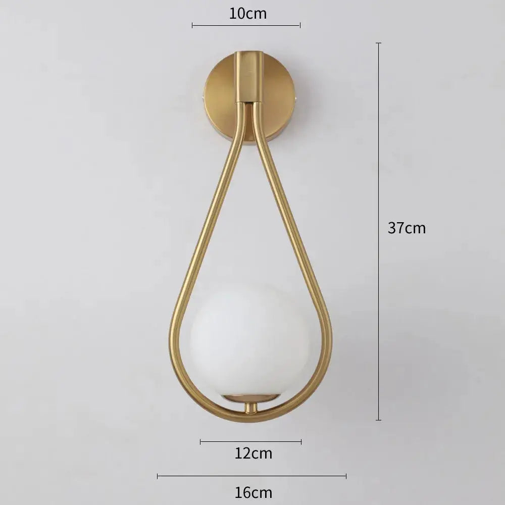 Nordic luxury glass-ball LED wall lamp by Simples Market; brass finish, modern minimalist wall sconce