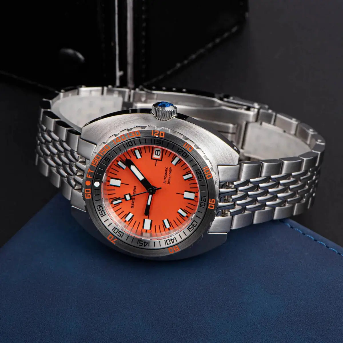 Seestern diver watch with orange dial and stainless steel bracelet, luminous hands, 200m water resistance