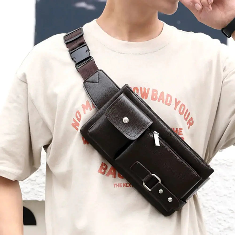 Leather waist bag by Simples Market, black fanny pack with front pocket and buckle strap.