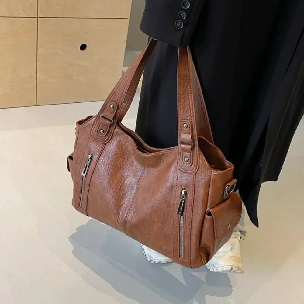 Simples Market brown PU leather shoulder bag for women with dual straps and front vertical zip pockets