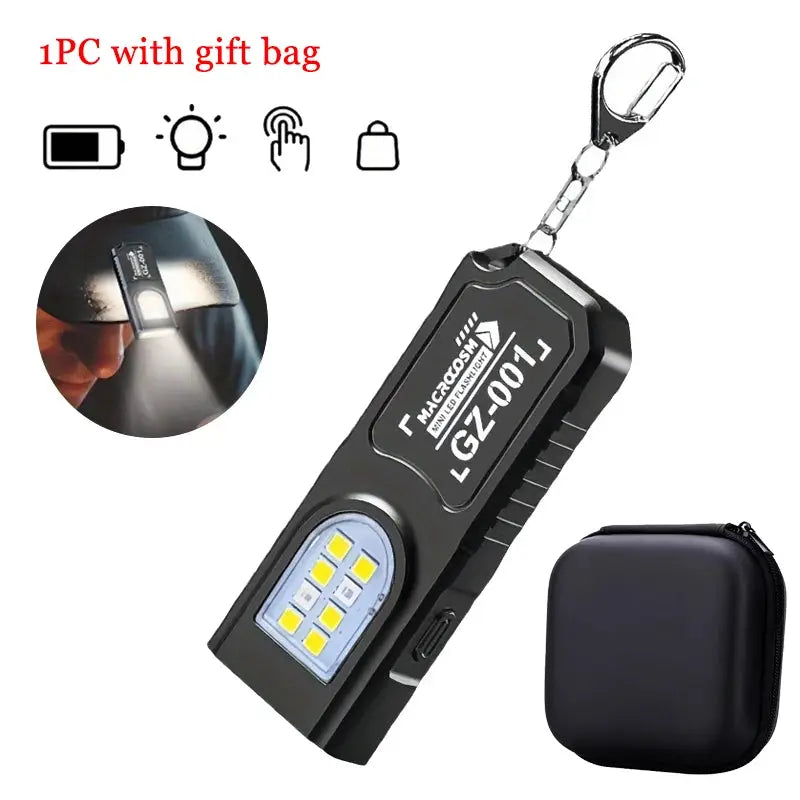 Powerful mini COB LED keychain flashlight, USB-C rechargeable, black pocket light with metal clip and carrying case.