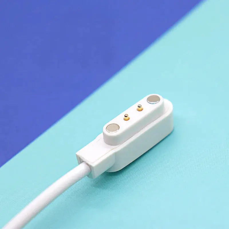 Smartwatch dock charger adapter, white, with USB cable and two gold contact pins. Simples Market