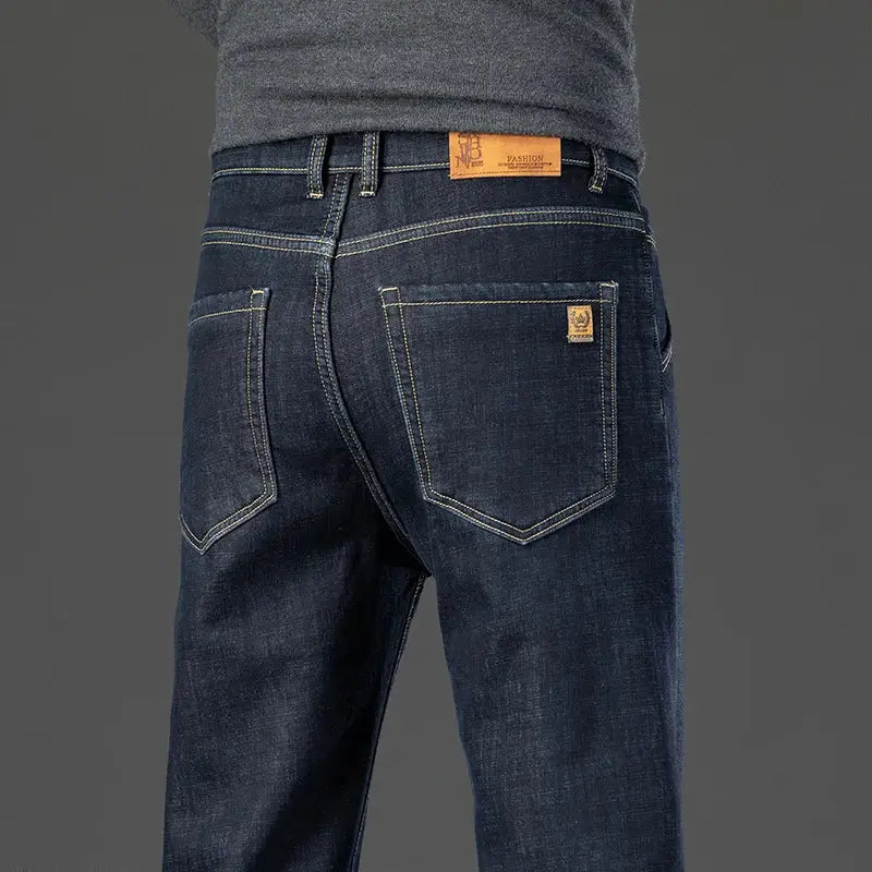 Men's fleece-lined denim jeans by Simples Market, dark blue straight-leg work trousers with yellow stitching