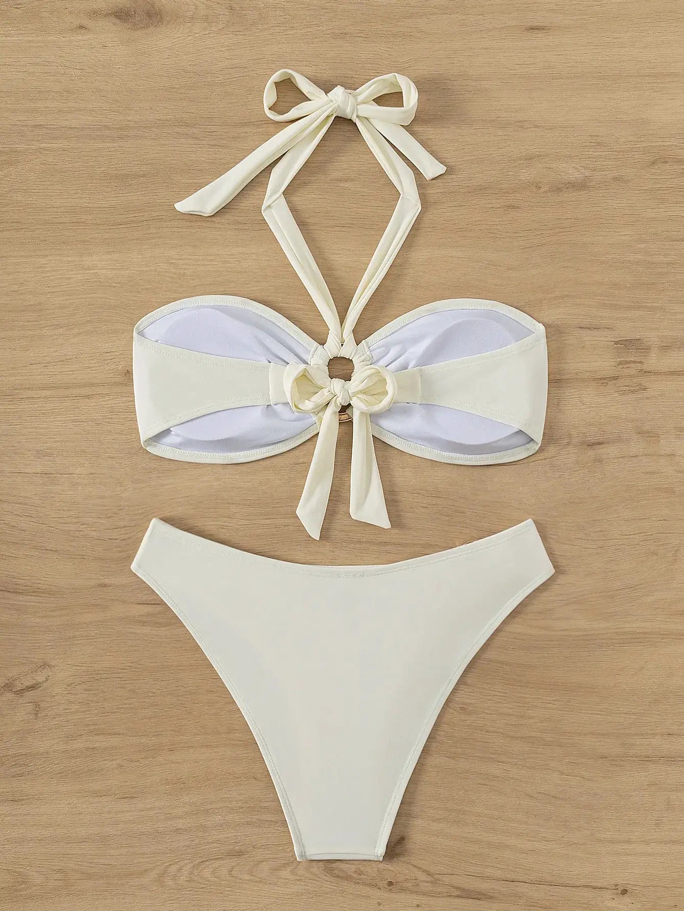 Simples Market ivory bandeau bikini set with halter neck straps and bow accents; Brazilian-cut bottoms (2 pieces)