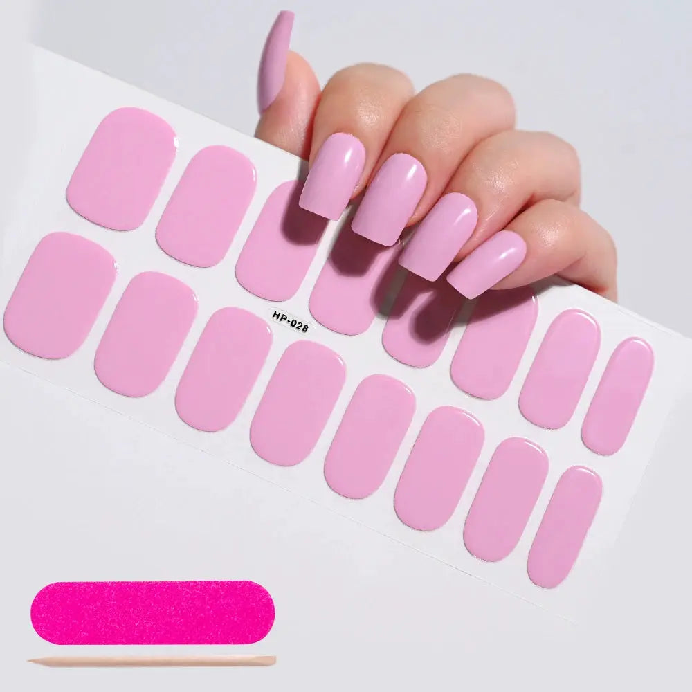 Semi-cured gel nail wraps sheet in pink; full-cover adhesive decals for manicure, shown on pink nails.
