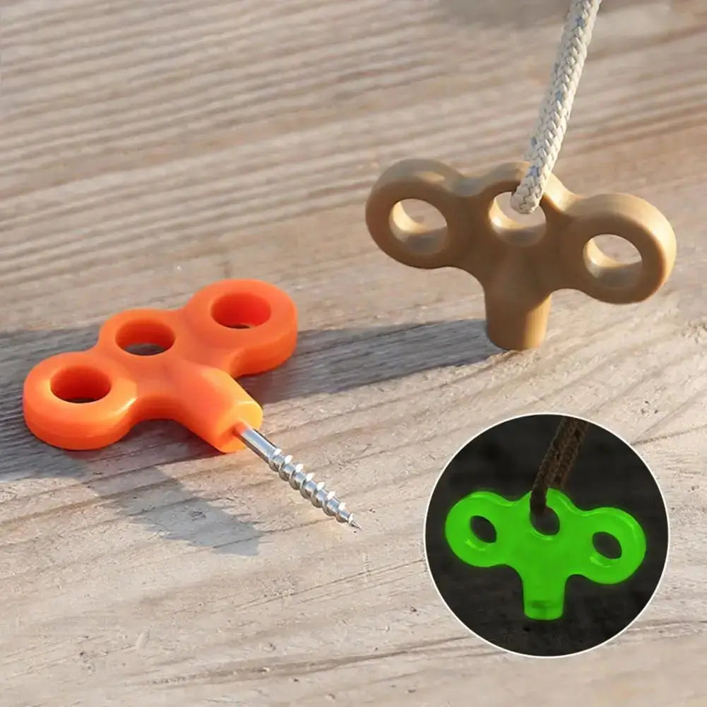 2pcs multi-rope ground anchors for outdoor use; orange and tan plastic with rope threaded through center