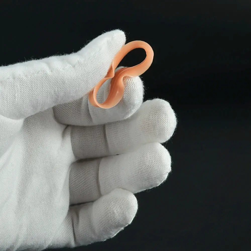 Pair of skin-tone soft flexible ear tunnels with double-flare ends