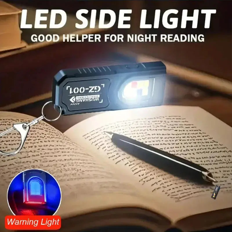 Powerful mini COB LED keychain flashlight, black with metal keyring, USB-C rechargeable pocket light.