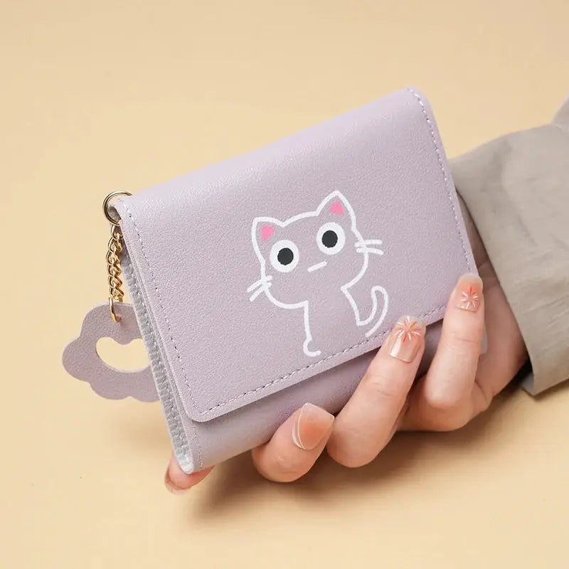 Purse by Simples Market; purple cat-themed compact wallet with chain for cards