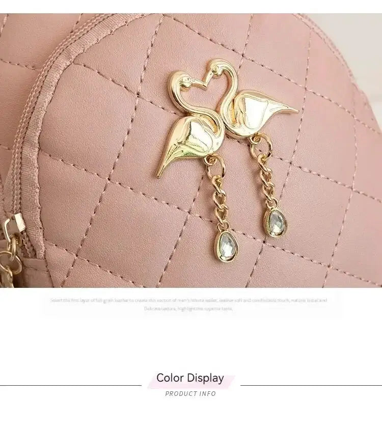 Simples Market fashion women's mini backpack in pink quilted faux leather with gold flamingo charms and crystal drops