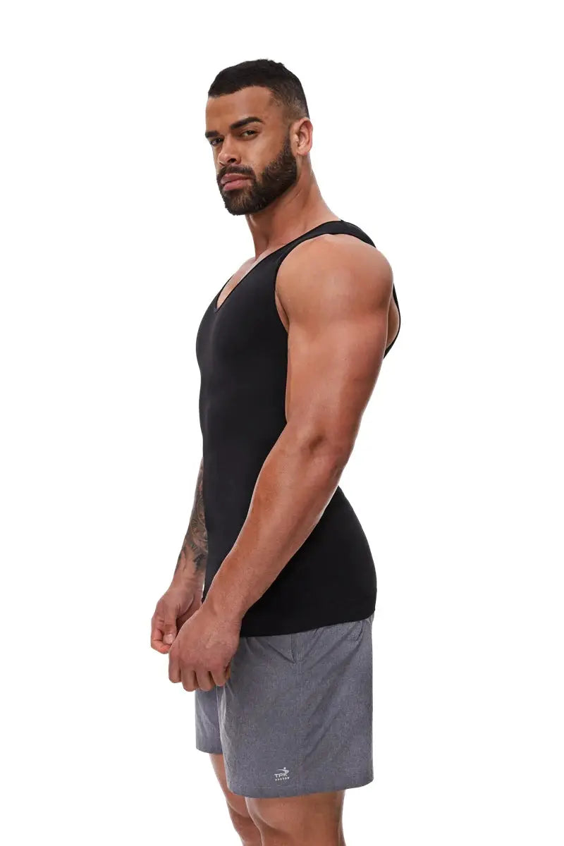 Men's black compression shirt and gray athletic shorts.
