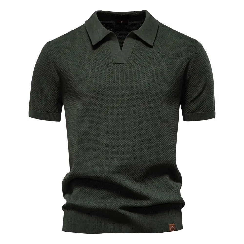 Men's green polo shirt with textured knit, breathable fabric and collared short sleeves