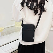 Black vertical shoulder messenger bag with compact crossbody design for phone and cards; SPORT logo visible