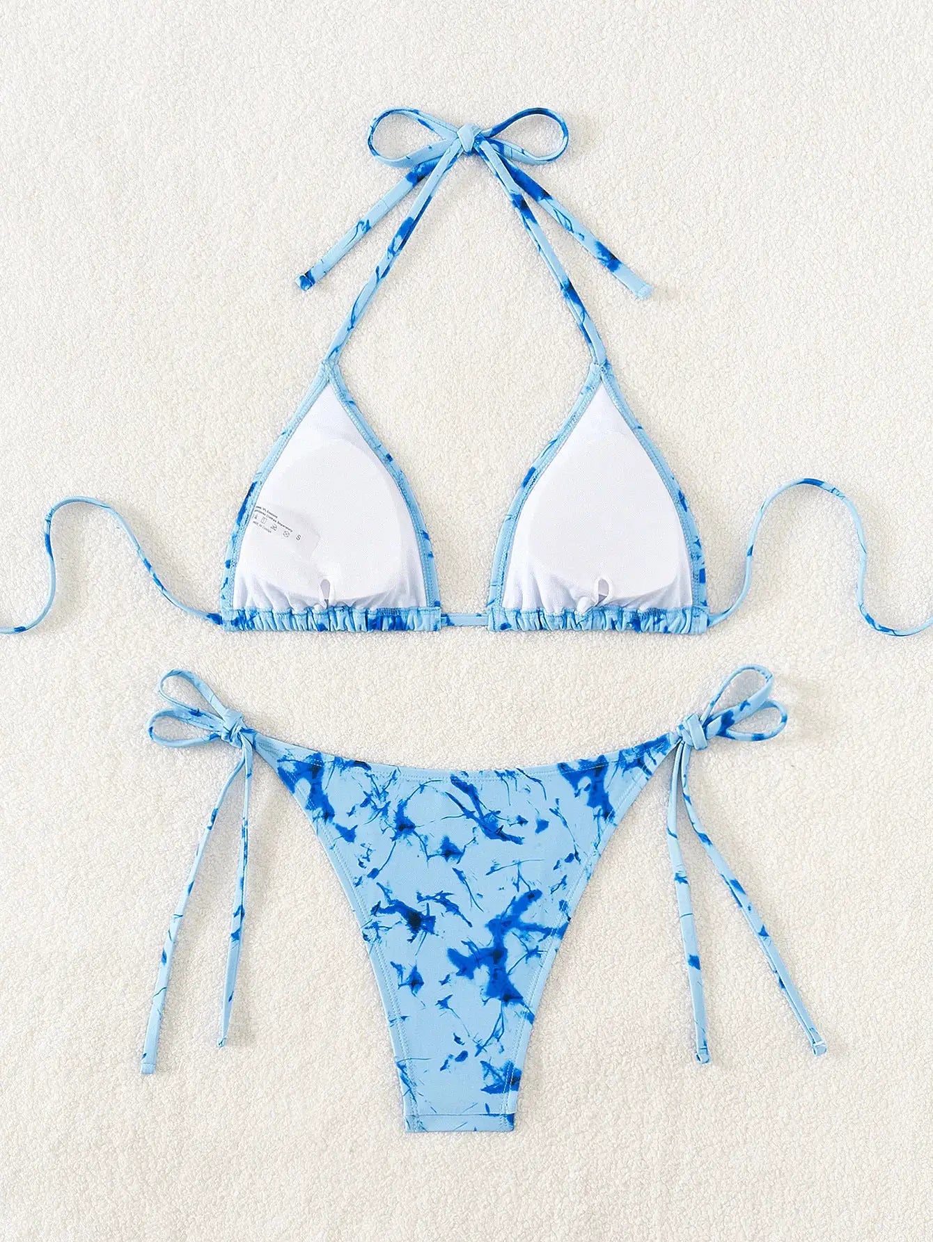 Blue floral triangle bikini set with halter top and Brazilian-cut string-tie bottoms