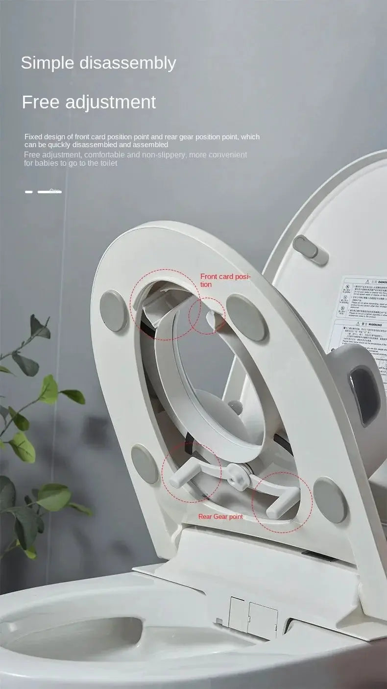 Baby and Child Toilet Seat Ring by Simples Market, white plastic with disassembly and adjustable front/back positions