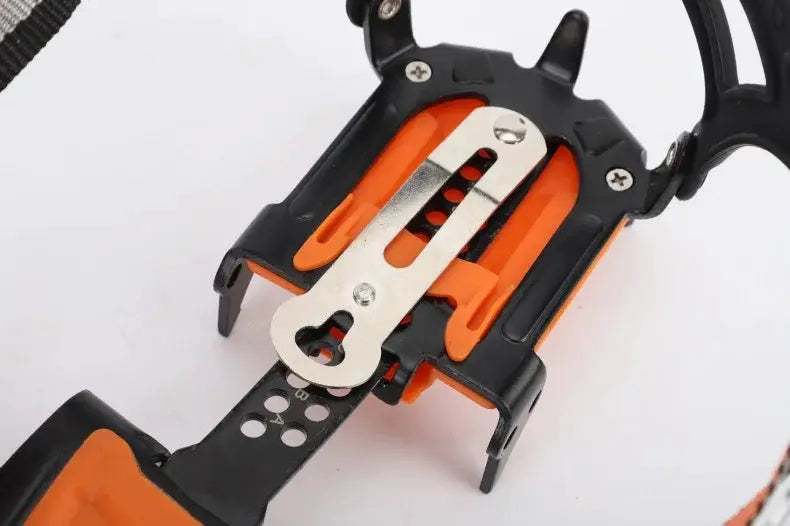 Simples Market 12-tooth ice crampons with orange frame and stainless steel spikes for anti-slip traction on boots