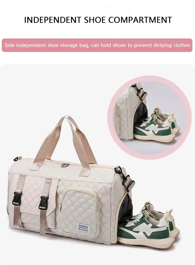Durable nylon travel duffle bag in cream with quilted pattern and front zip pocket, twin top handles.