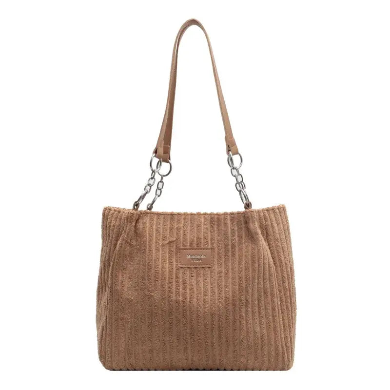 Simples Market women corduroy shoulder bag in tan with fixed shoulder strap, metal chain accents, and large capacity.