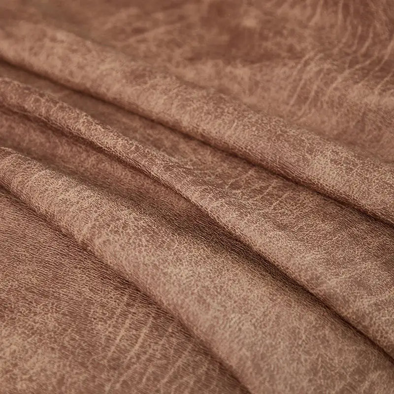 Sofa cover in brown PU leather-style fabric, waterproof and stretchable for 1/2/3 seater recliners.