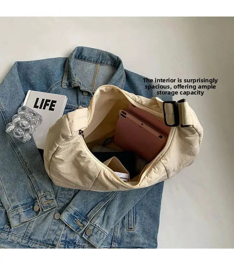 Simples Market beige soft-cloth shoulder bag; crossbody style with adjustable strap and roomy interior.