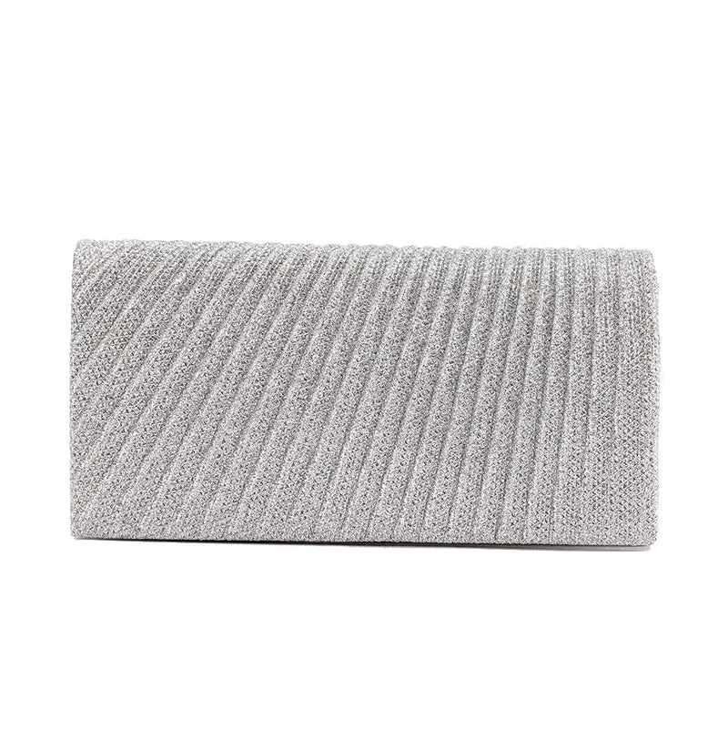 Women's silver glitter evening clutch purse with a pleated envelope design.