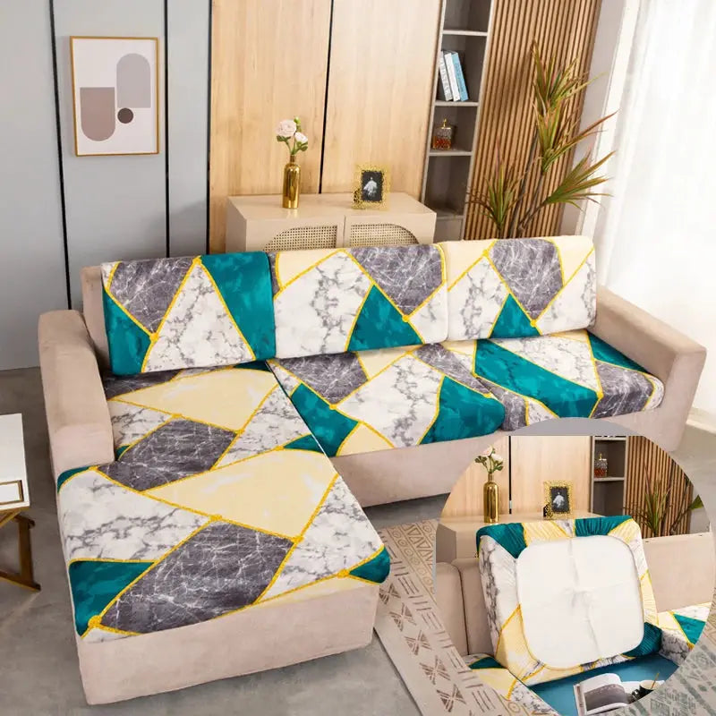 Stretch couch cushion slipcovers by Simples Market with teal, gray marble, and yellow geometric pattern on a beige sofa
